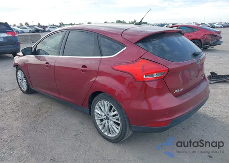 2016 Ford Focus Titanium z USA, uszkodzony, nr VIN 1FADP3N27GL256143